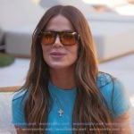 Khloe’s blue top and sunglasses on The Kardashians Khloe’s blue top and sunglasses on The Kardashians