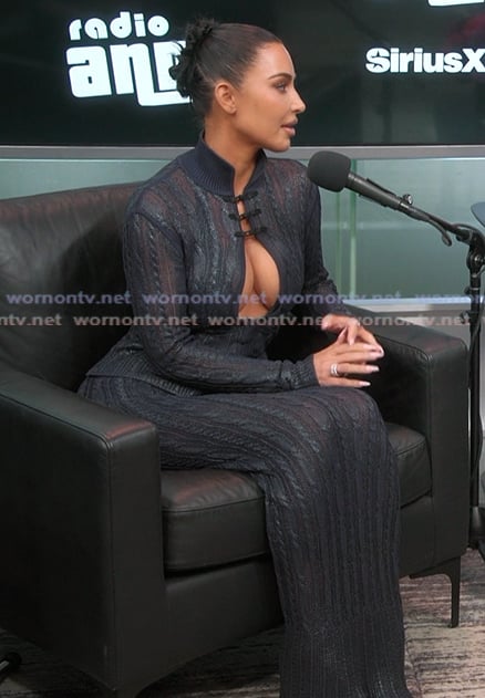 Kim's black lace top and skirt set on The Kardashians
