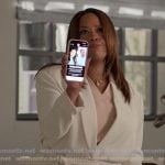 Krystal's white belted jacket on Reasonable Doubt