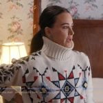 Kyle’s white geometric patterned turtleneck sweater on The Real Housewives Ultimate Girls Trip
