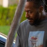 Lewis’s grey printed tee on Reasonable Doubt