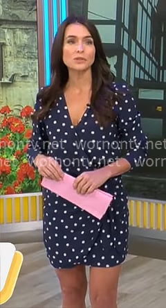 Lilia Luciano's navy polka dot wrap dress on CBS Mornings