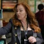 Melissa's black pinstripe double breasted blazer on Abbott Elementary