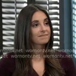 Molly’s dark purple cardigan with gold buttons on General Hospital