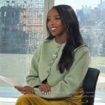Mona's green jacket on Extra