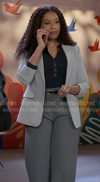 Naomi’s black henley top and grey pinstripe blazer on Beyond the Gates Naomi’s black henley top and grey pinstripe blazer on Beyond the Gates