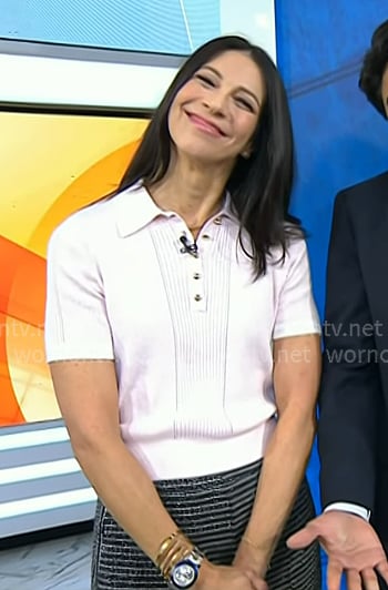 Natalie’s pink polo and black striped pants on Today