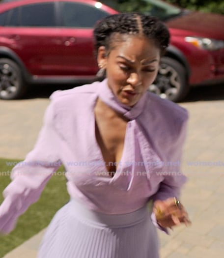 Regina's purple cutout top on Reasonable Doubt