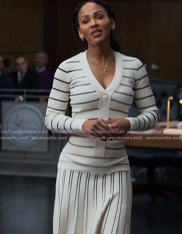 Regina’s white striped top and skirt on Reasonable Doubt