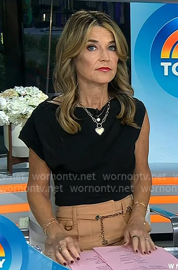 Savannah’s black asymmetric top and flare pants on Today