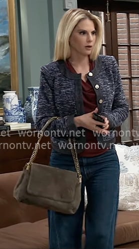 Serena’s navy tweed jacket and suede bag on General Hospital Serena’s navy tweed jacket and suede bag on General Hospital