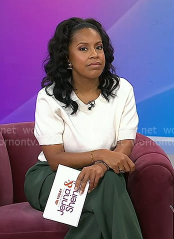 Sheinelle’s white short sleeve sweater and green pants on Today Sheinelle’s white short sleeve sweater and green pants on Today