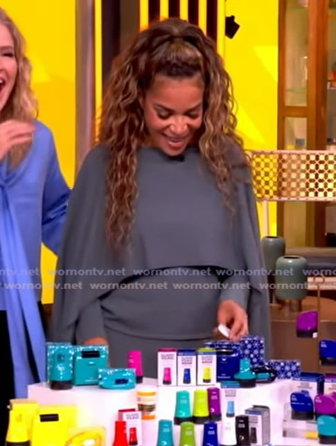 Sunny’s blue drape sweater top on The View