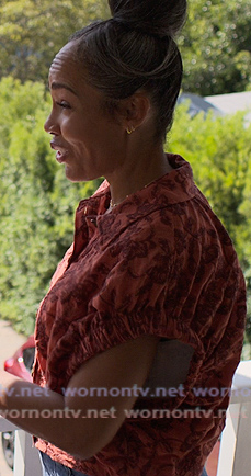 Tatiana's orange floral top on Reasonable Doubt