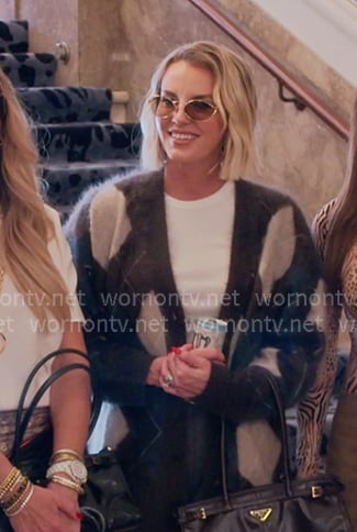 Whitney’s brown argyle knit cardigan on The Real Housewives of Salt Lake City Whitney’s brown argyle knit cardigan on The Real Housewives of Salt Lake City