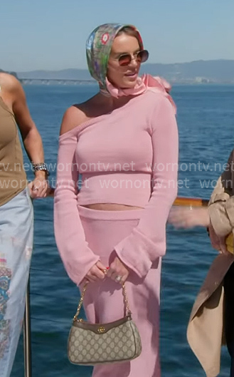 Whitney’s pink off-shoulder sweater and skirt on The Real Housewives of Salt Lake City Whitney’s pink off-shoulder sweater and skirt on The Real Housewives of Salt Lake City